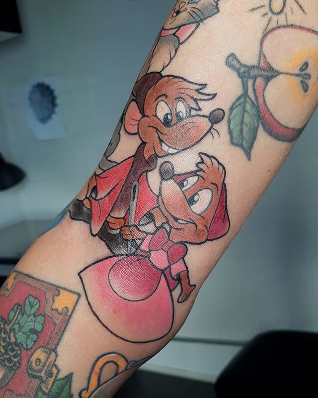 Cartoon tattoo of Jag and Mary the mice on the hand