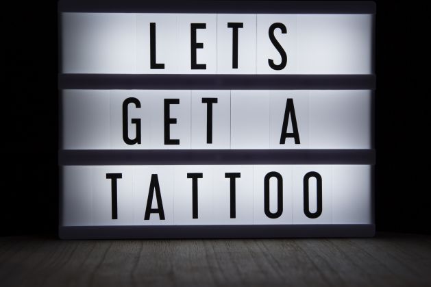 Get a tattoo advertisement sign 