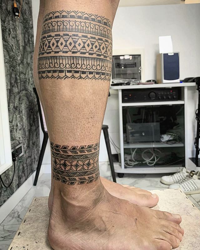 Maori tattoo on the right calf