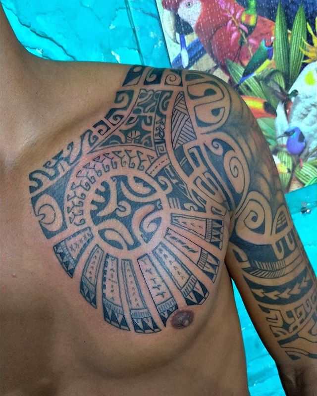Maori tattoo on the left shoulder