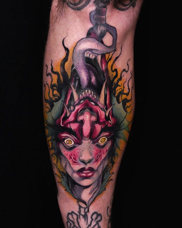 Neotraditional tattoo of a female monster on the right leg