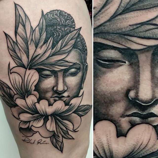 Oriental tattoo of Buddha head with lotus flowers on the leg
