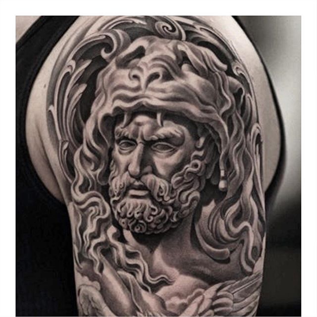 Realistic tattoo of Hercules on the left arm