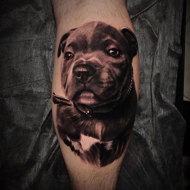 Realistic tattoo of puppy Bulldog on the right calf