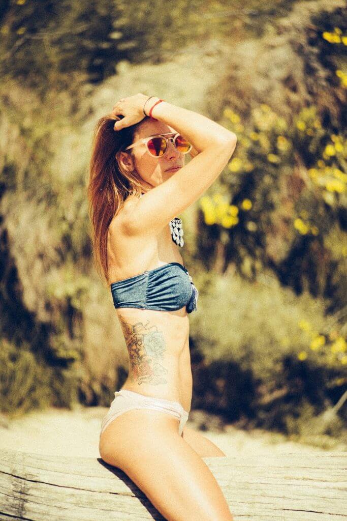 Flower color tattoo on the ribs
