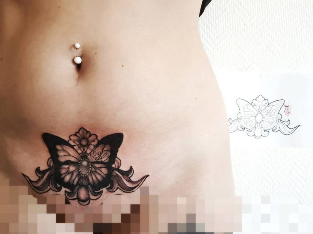 Intimate Black tattoo in the pubic zone