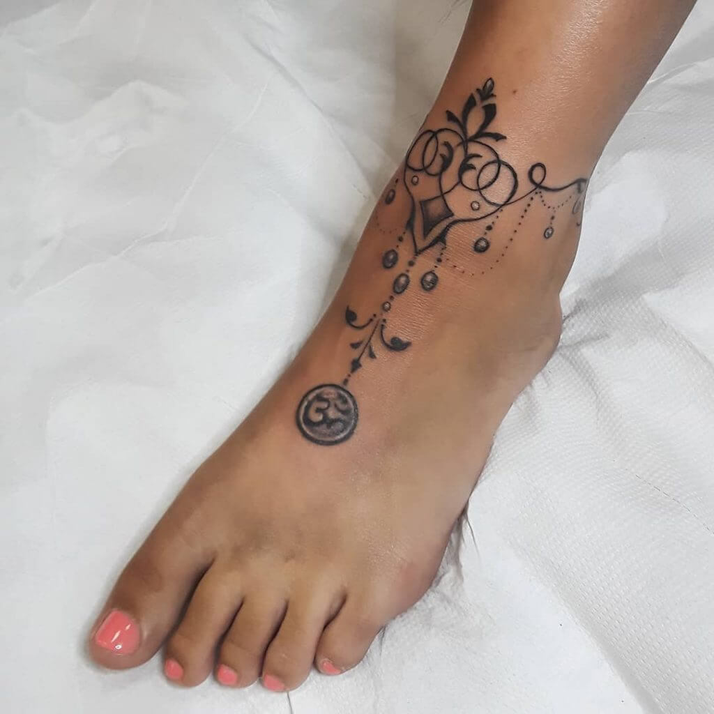 Black Female tattoo on the foot