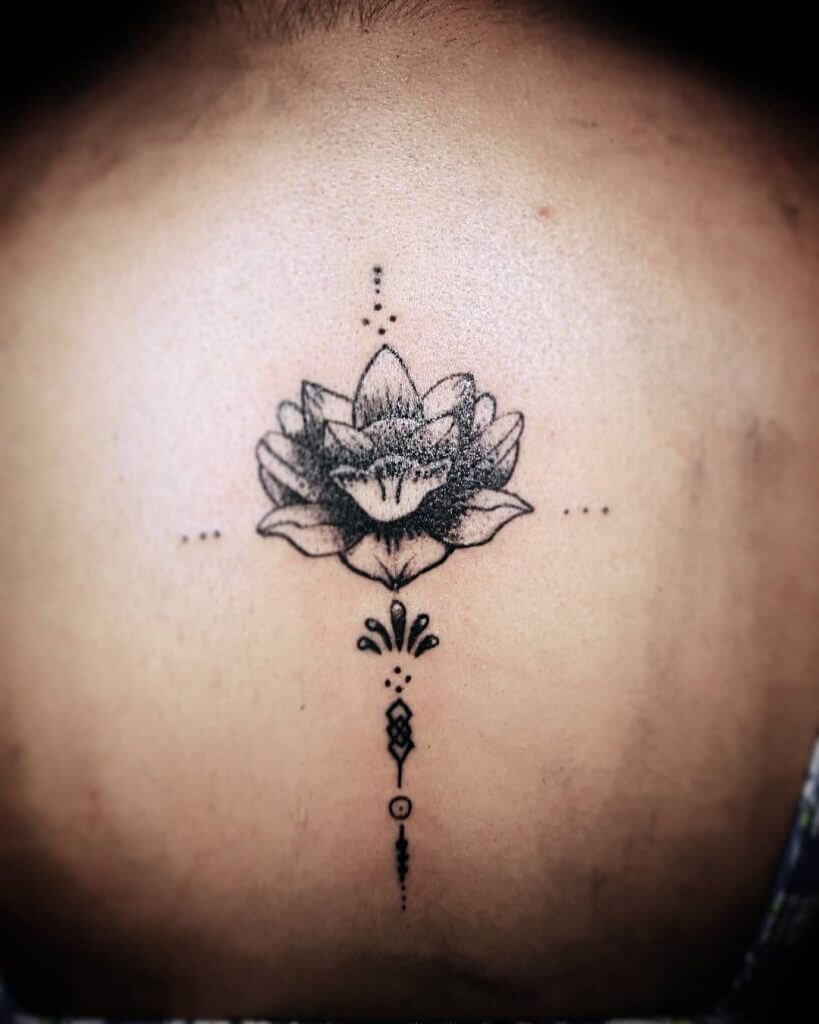 Dot work rose tattoo on the back