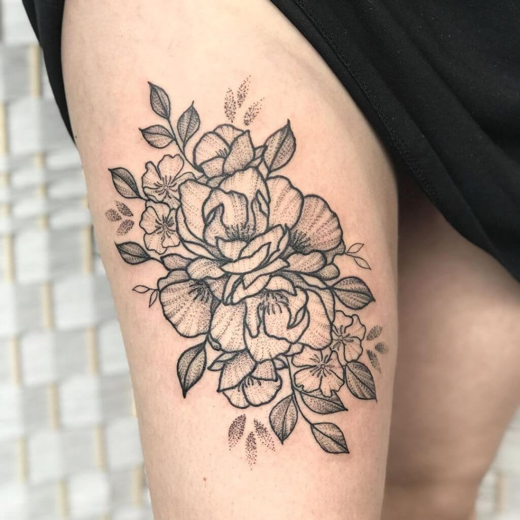Dot work rose tattoo on the right thigh