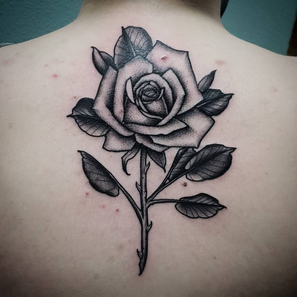 Dot work rose tattoo on the back
