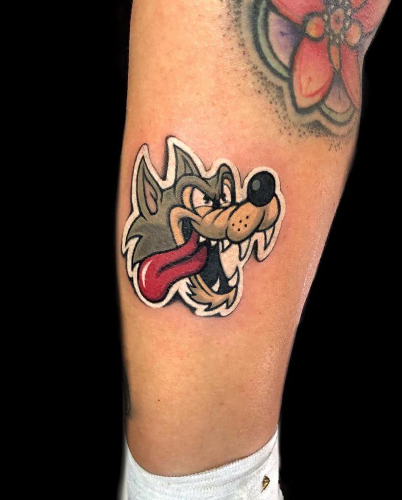 Wolf Sticker tattoo on the right forearm
