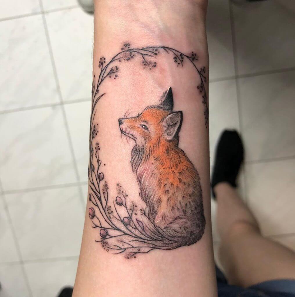 Color Forearm tattoo of a fox