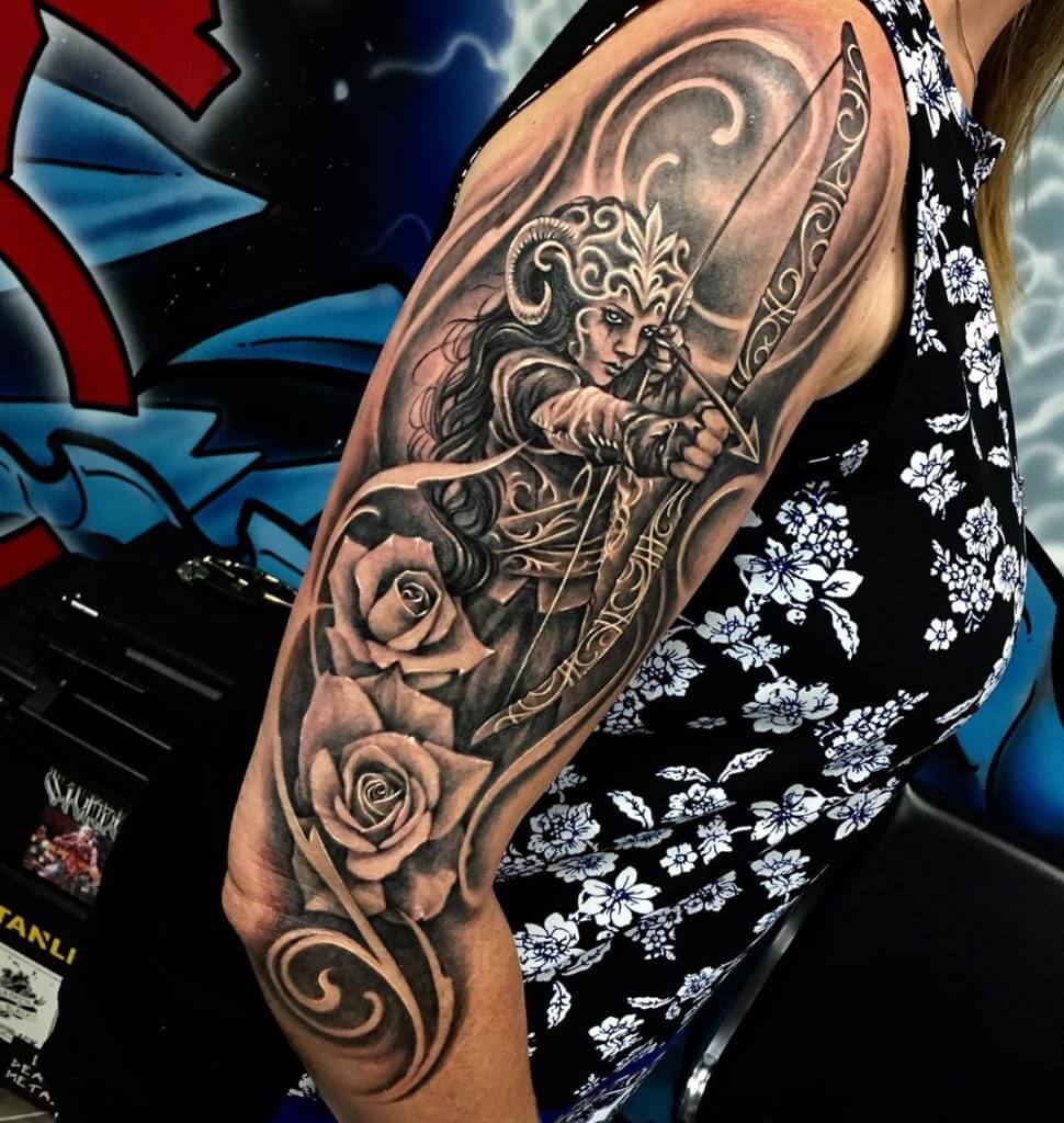 Black and Gray Tattoo of a female Warrior on the right shoulder