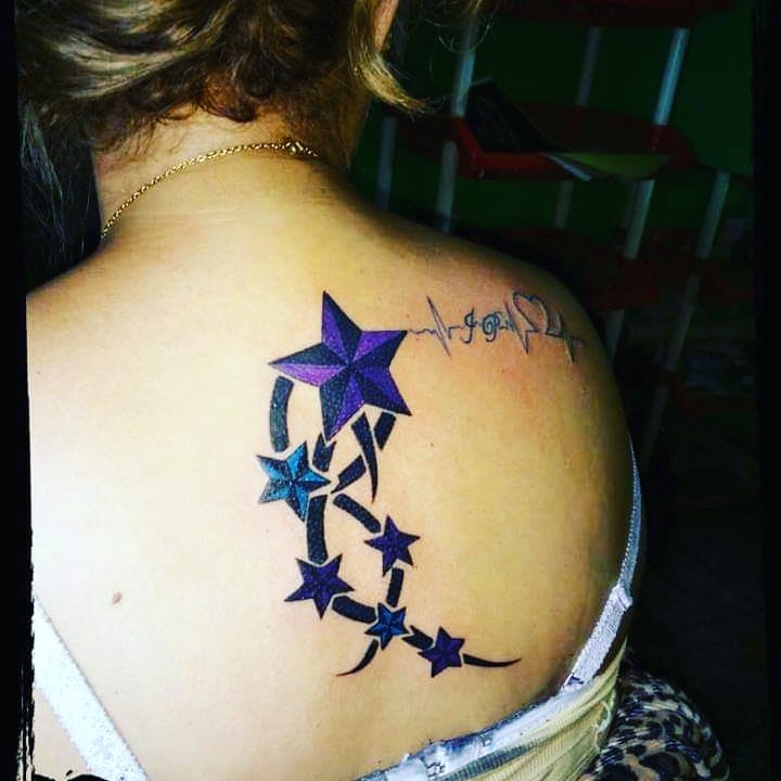 Color Stars tattoo on the back