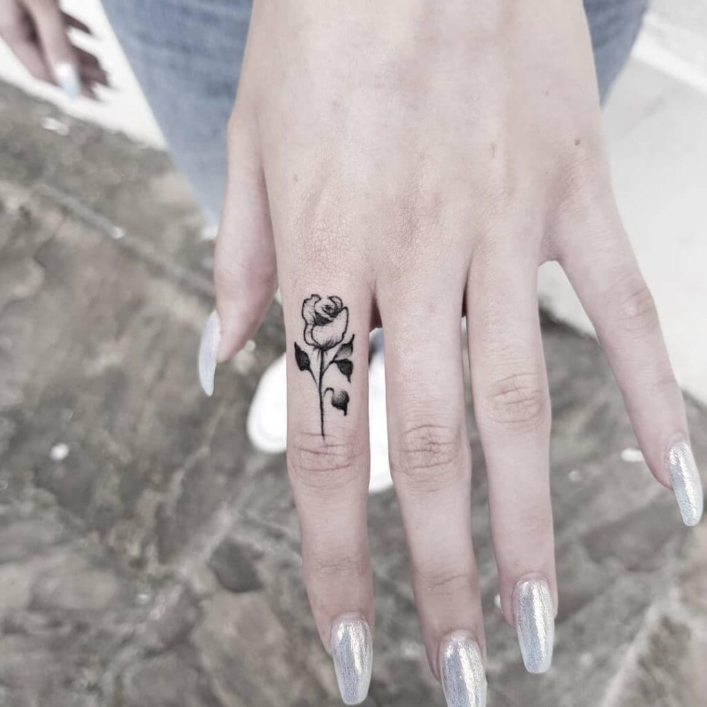 Black Rose tattoo on the left hand