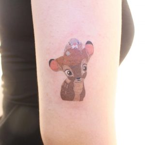 Color Small Cartoon Tattoo of Bambi and Thumper on the right arm