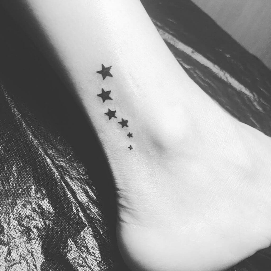 Black Stars tattoo on the foot