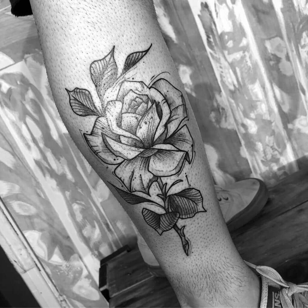 Black Rose tattoo on the right leg