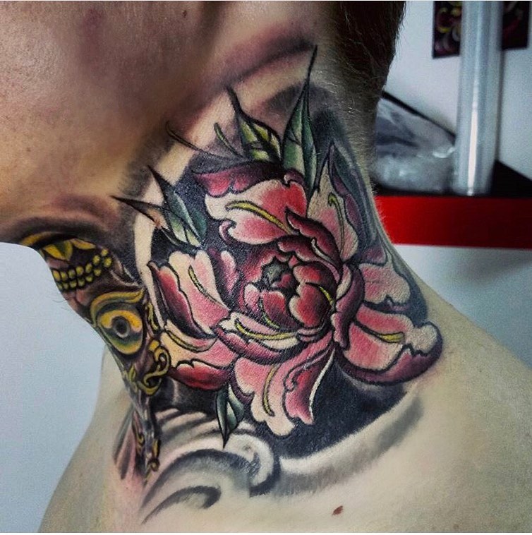 Color Rose tattoo on the throat