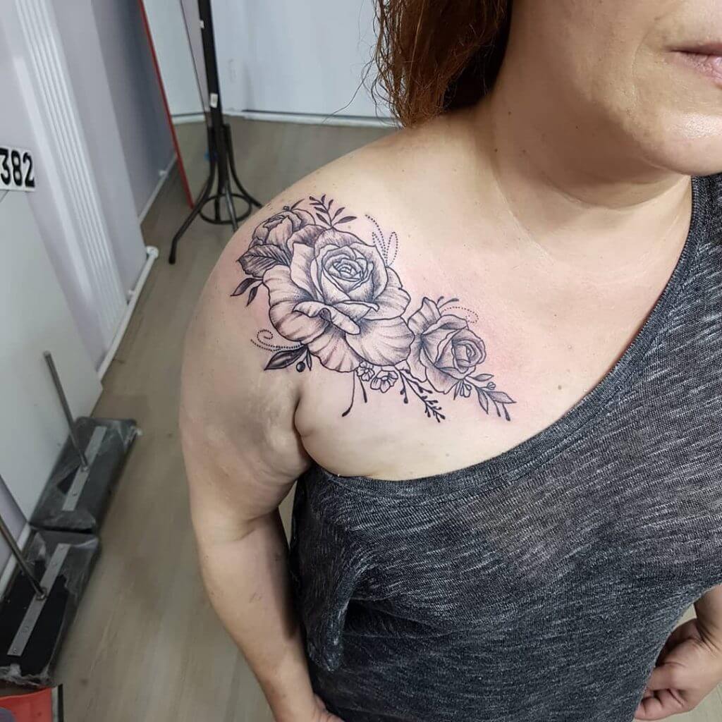 Black Rose tattoo on the right shoulder