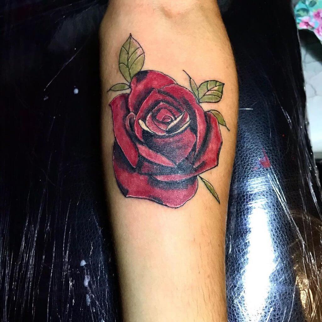 Color Rose tattoo on the left leg