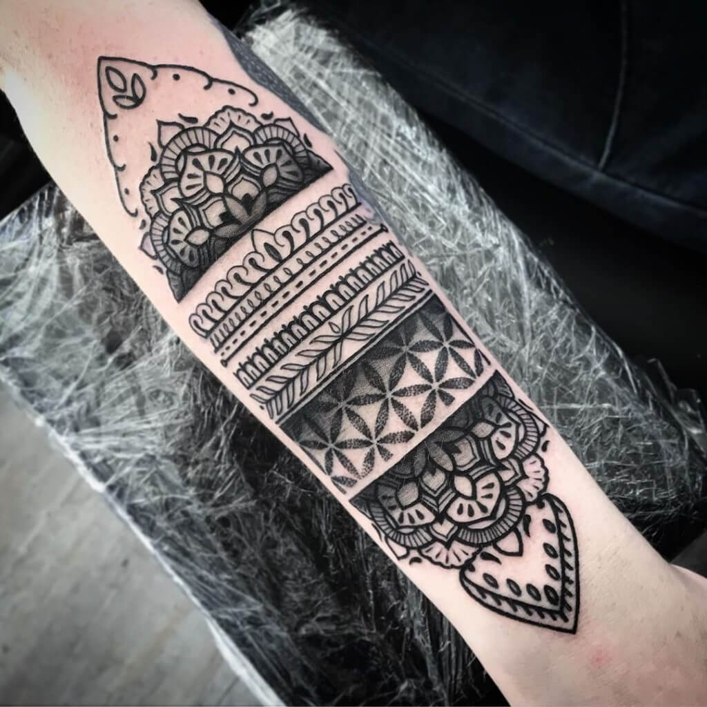 Black Maori Forearm Tattoo