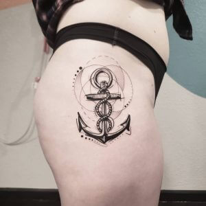 Black Anchor tattoo on the right leg