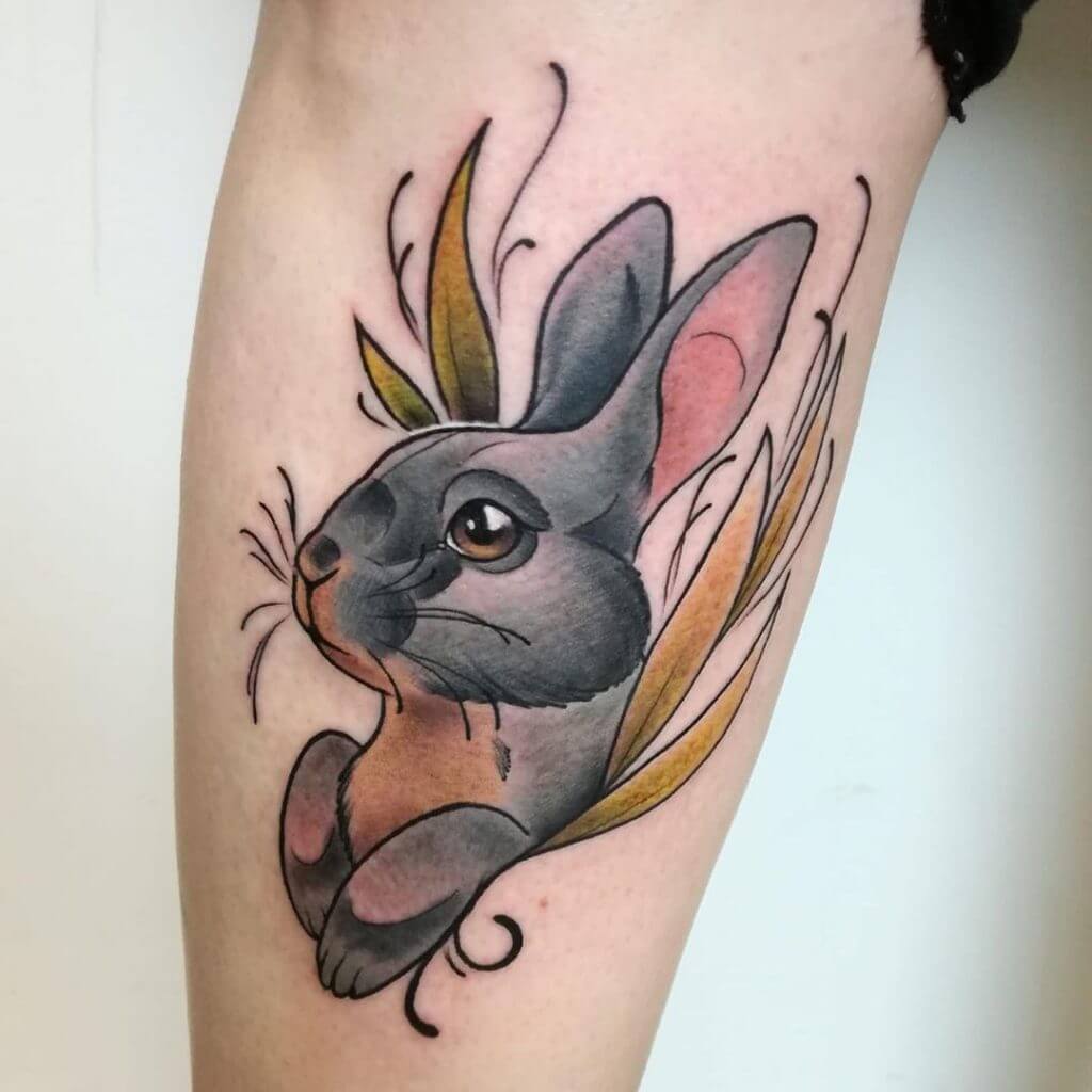 Color Bunny tattoo on the forearm
