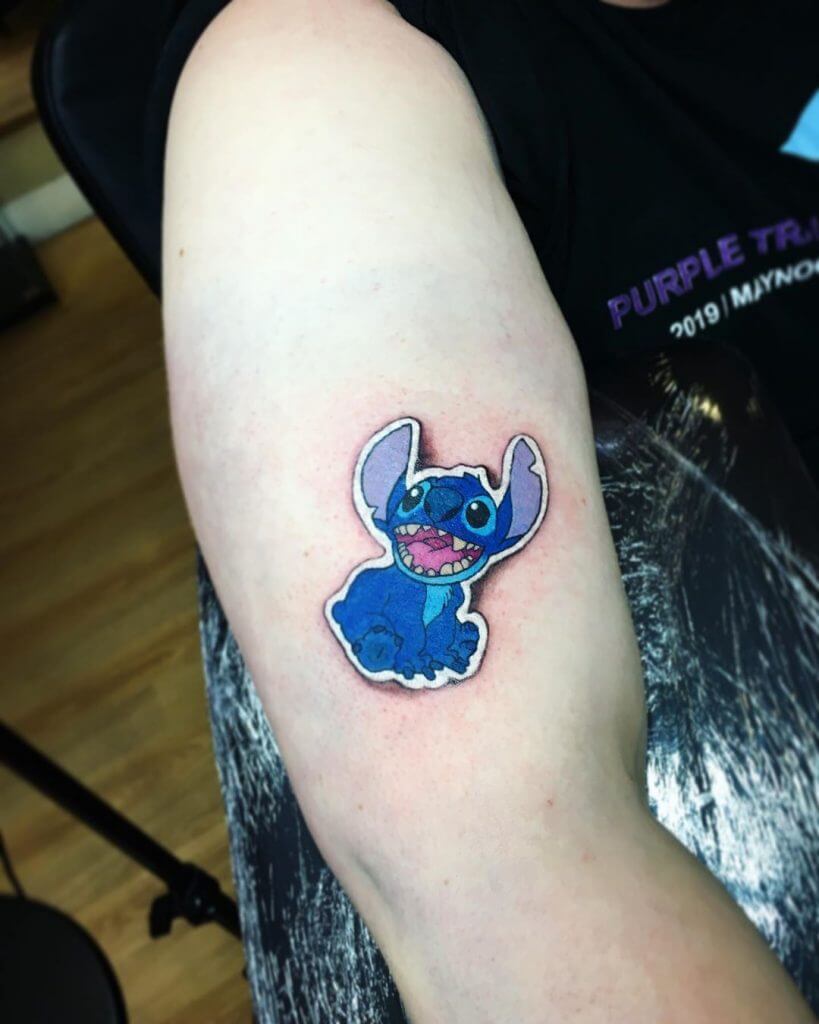 Stitch Sticker tattoo on the right arm