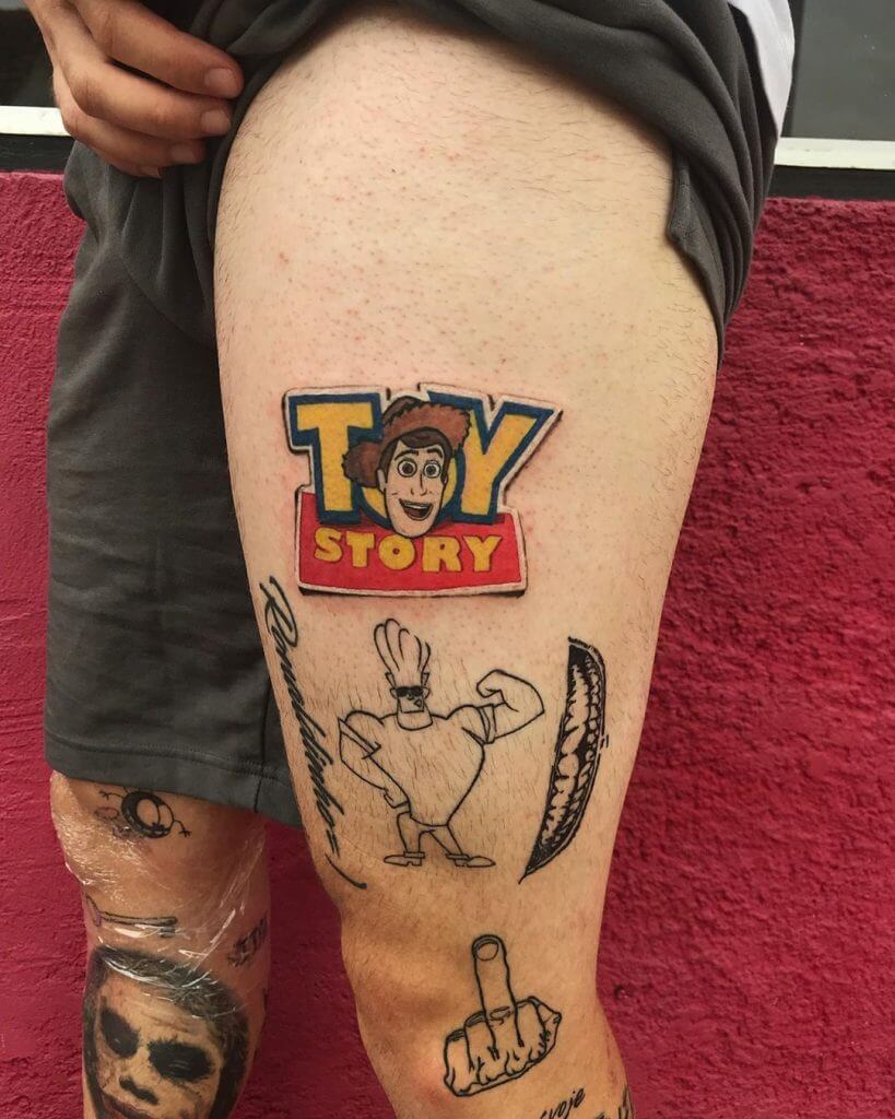 Toy Story Sticker tattoo on the left thigh
