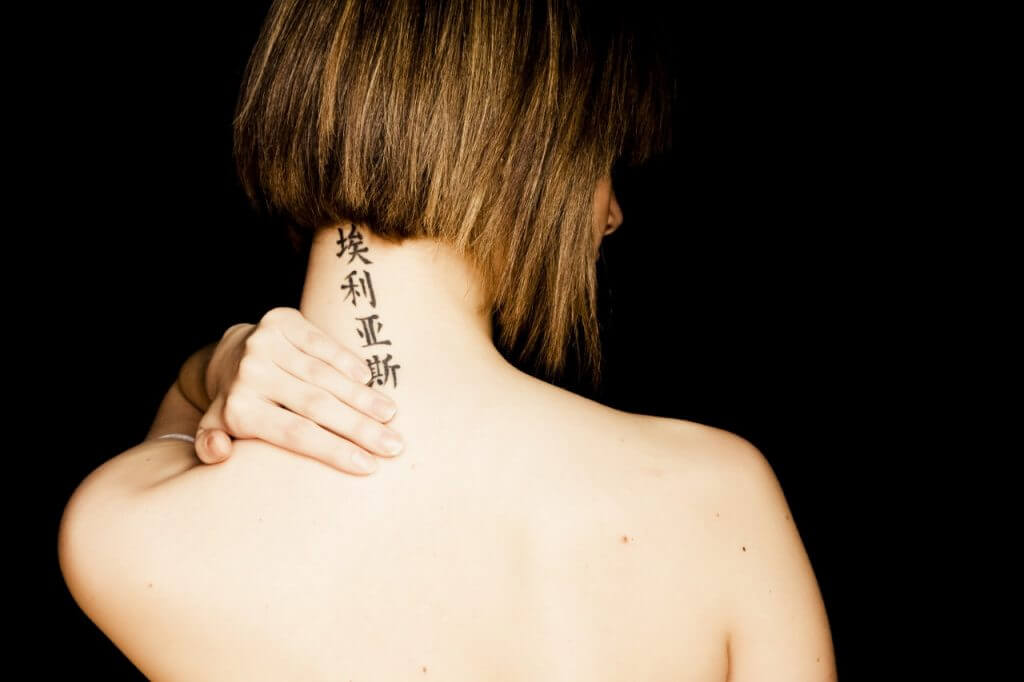 Tattoo on the girls neck