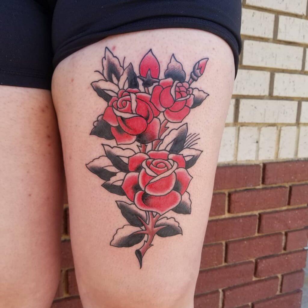 Dotwork color flower tattoo on the thigh