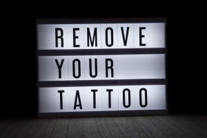 Remove a tattoo advertisement sign