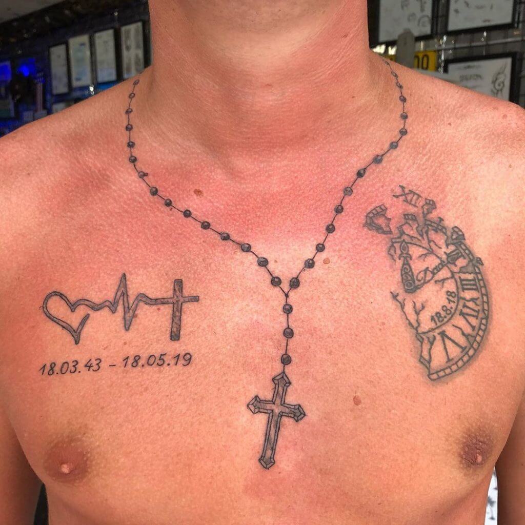 A cross on the chest tattoo