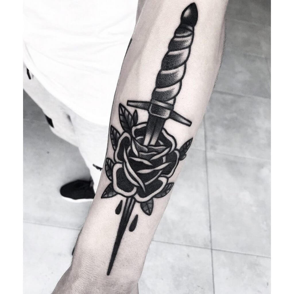 A rose-dagger tattoo