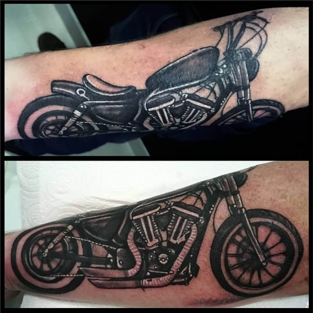 Mens motorbike tattoo of a bike on the forearm