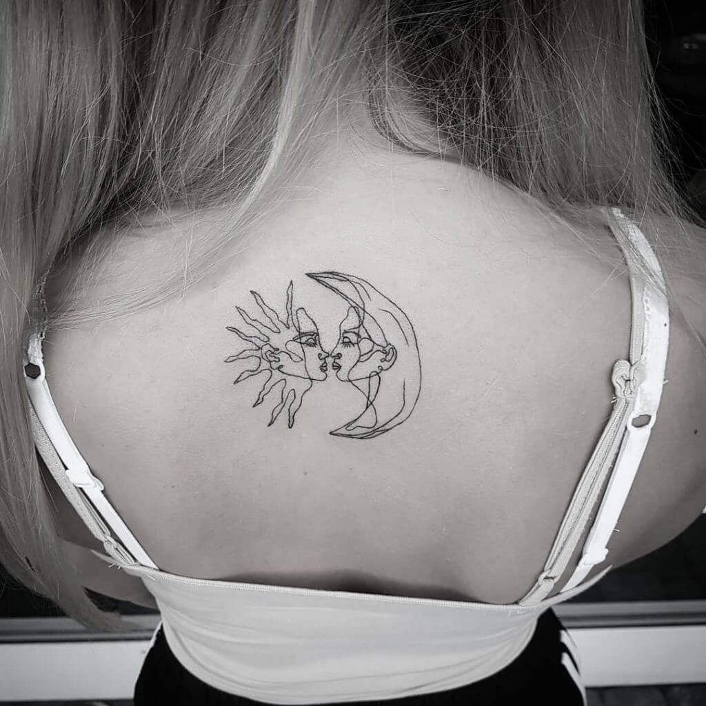 Black Sun tattoo with a moon on the back