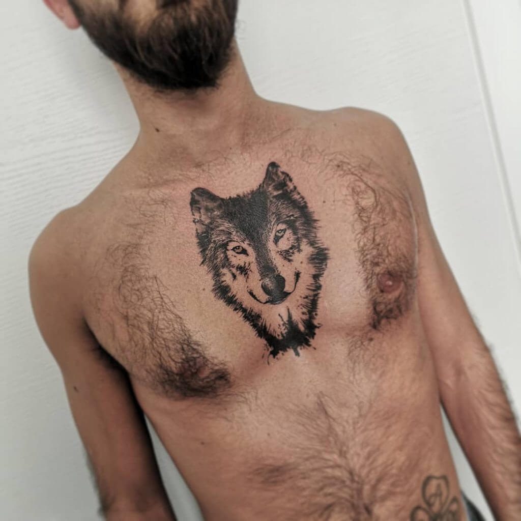 Black Animal tattoo of a wolf on the chest