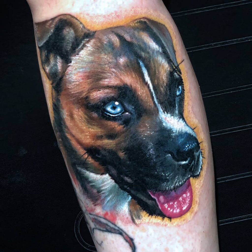 Color Animal tattoo of a dog on the calf