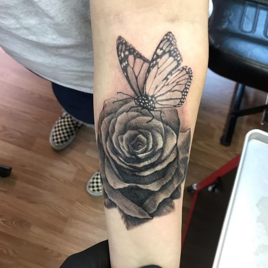 Black and Gray Butterfly tattoo on the left forearm
