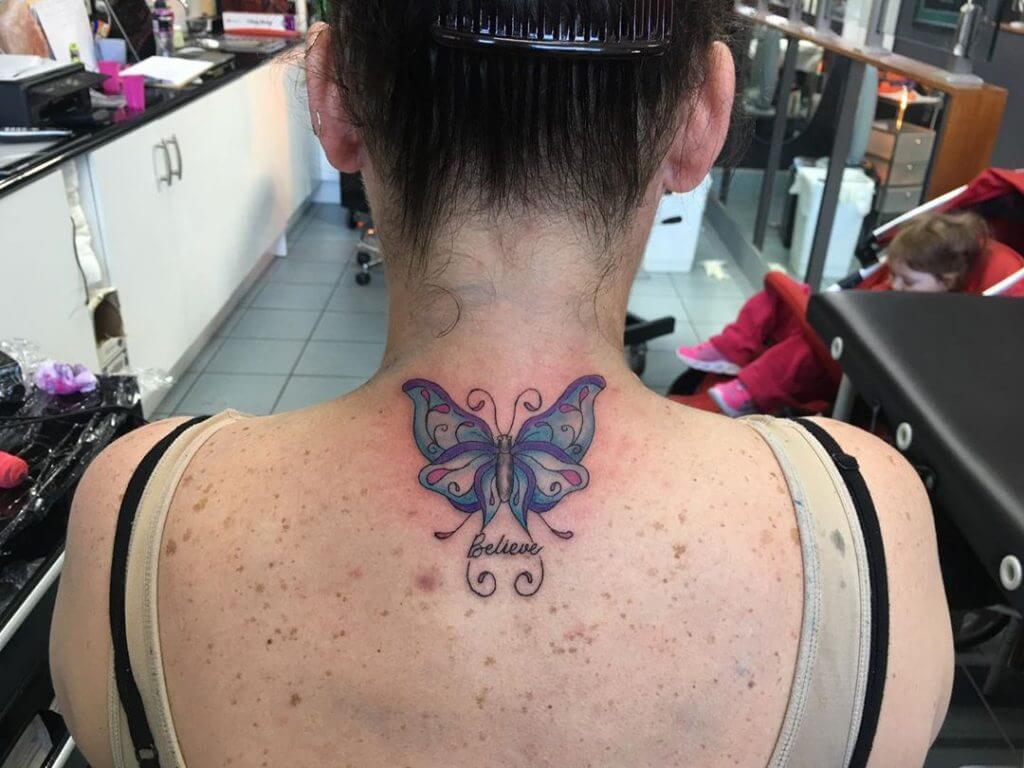 Color Butterfly tattoo on the back