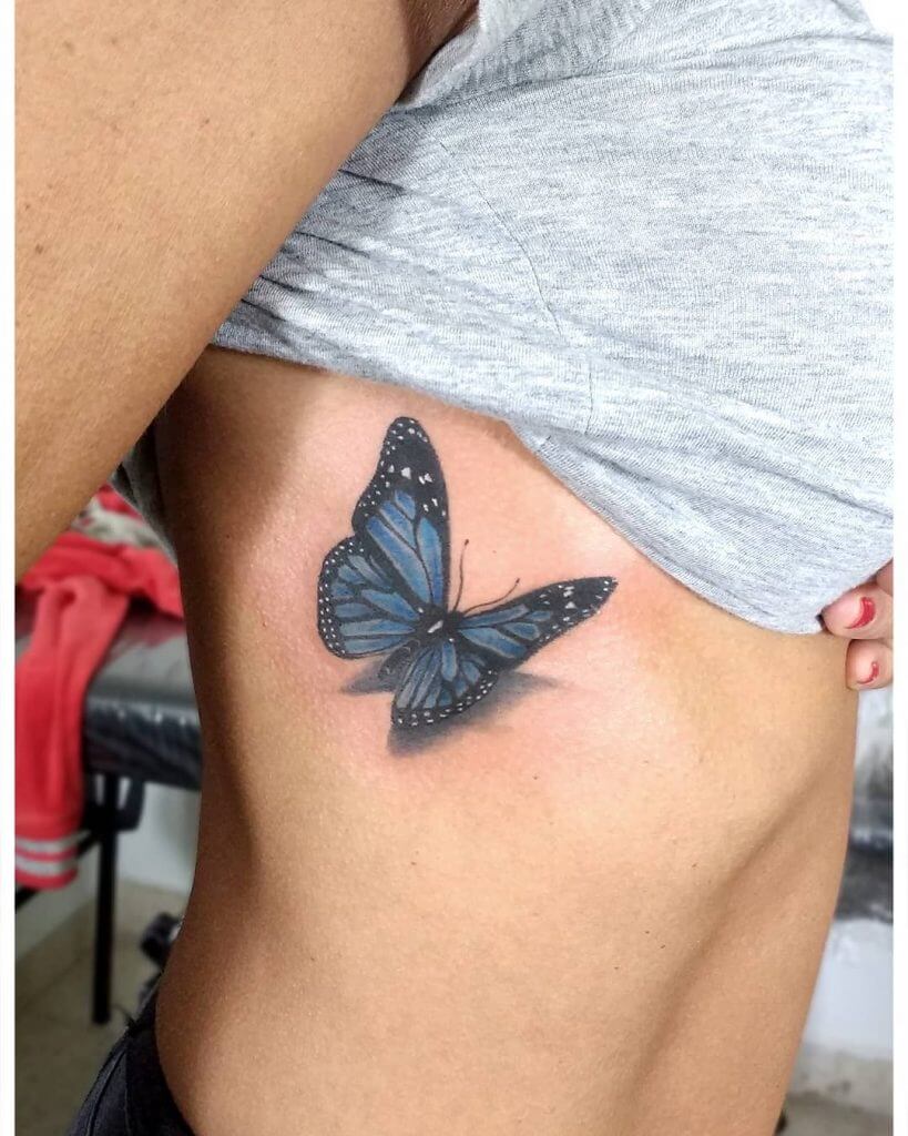 3D Color Butterfly tattoo on the ribs