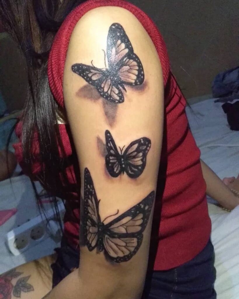 3D Color Butterfly tattoo on the left arm