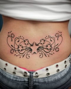 Stars tattoo on the womans lower back