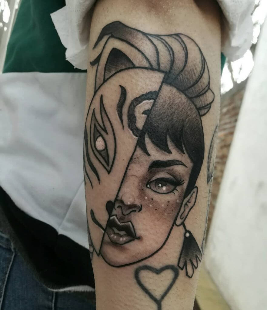 Neo traditional tattoo for woman of a female face with mask on the right arm