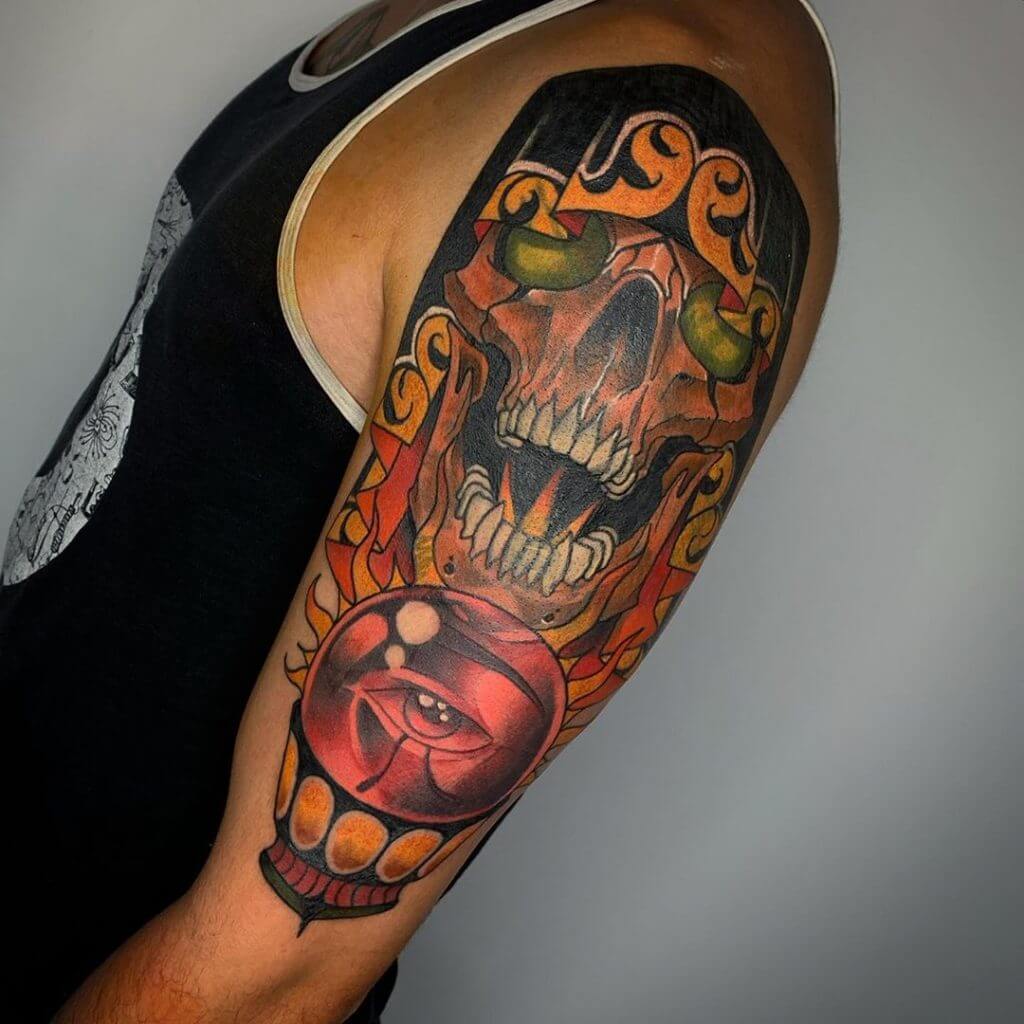 Mens neo traditional tattoo of a skull on the left shoulder