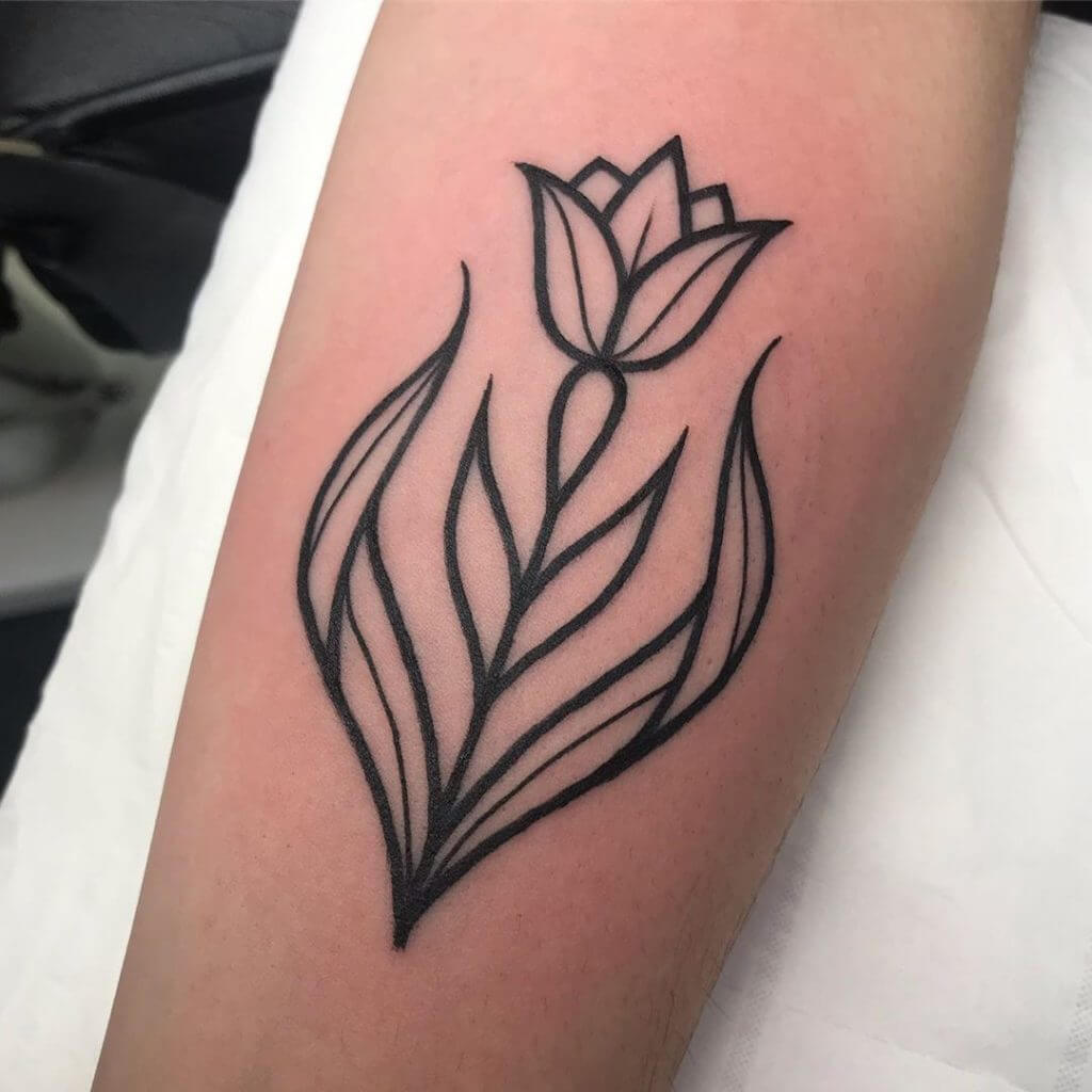 Black geometric tulip tattoo on the arm