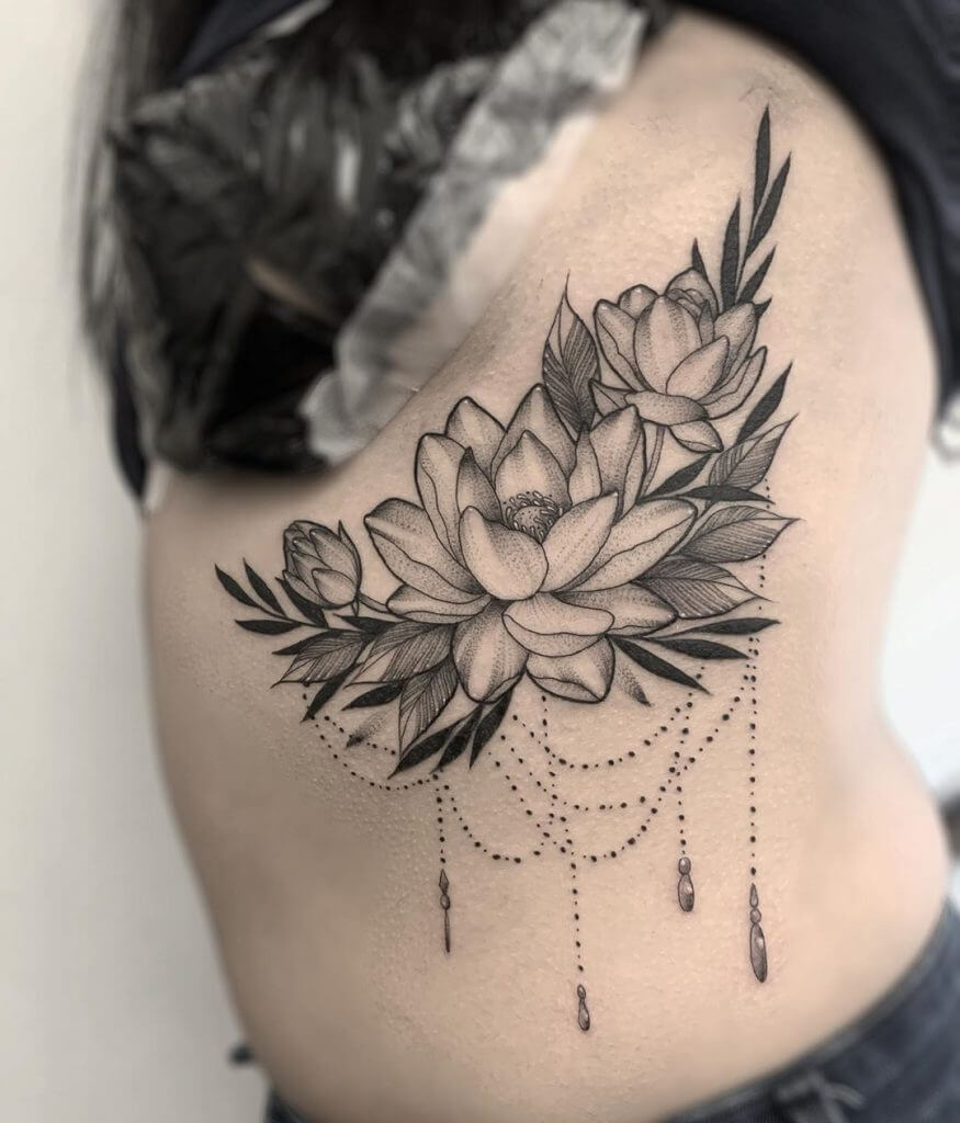 Lotus tattoo on the ribs