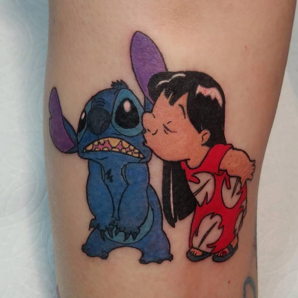 Women color cartoon tattoo of Stitch and Lilo