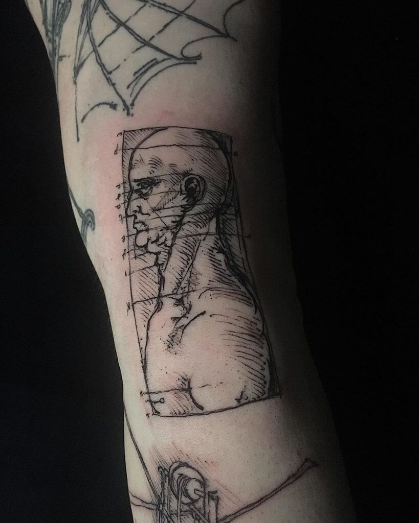Men black dotwork tattoo on the left arm